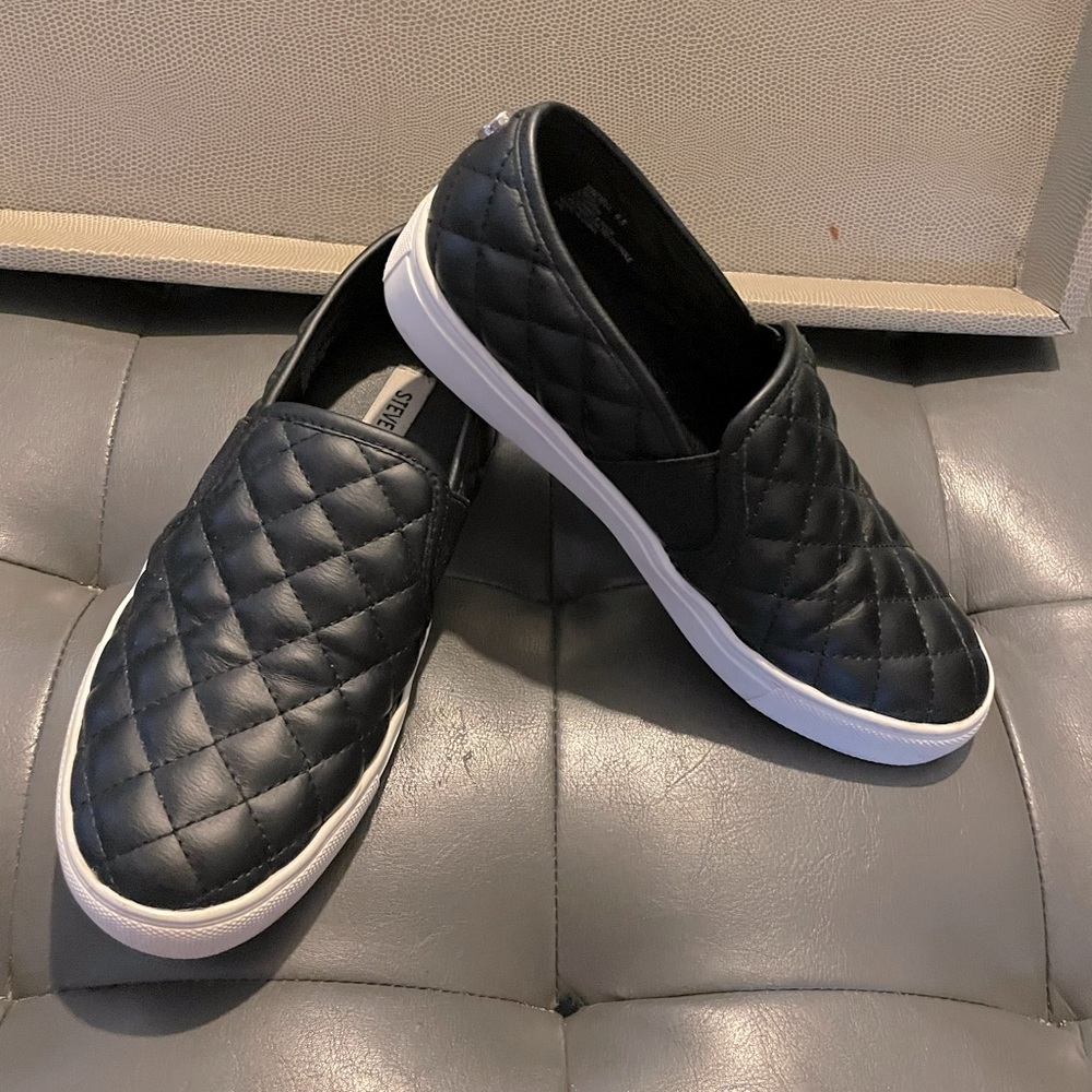 Steve Madden slip on shoes . Leather coated. size 6.5